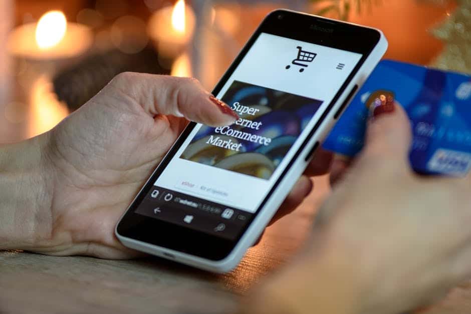 pexels-photo-230544-230544 Person Using Black And White Smartphone and Holding Blue Card