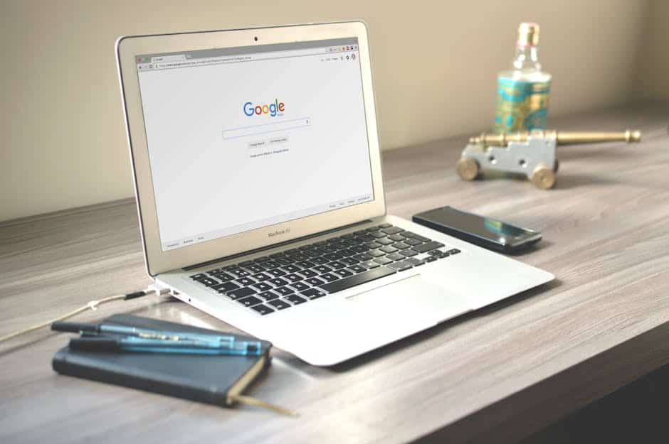 pexels-photo-67112-67112 Macbook Air on Grey Wooden Table